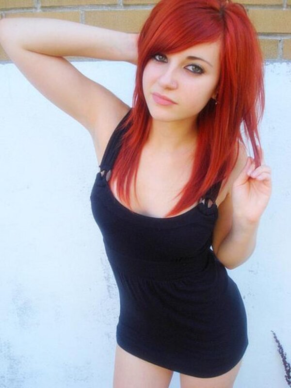 woman with red hair posing