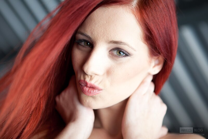woman with red hair posing