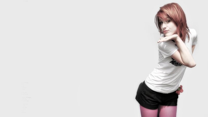 woman with red hair posing