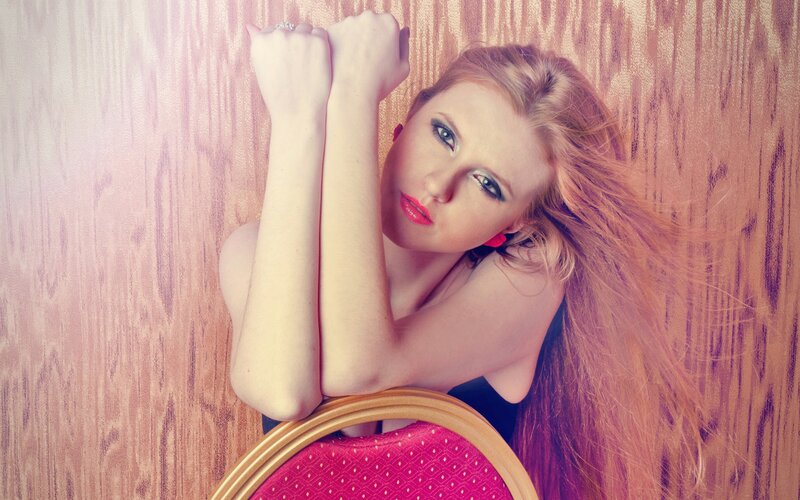 woman with red hair posing