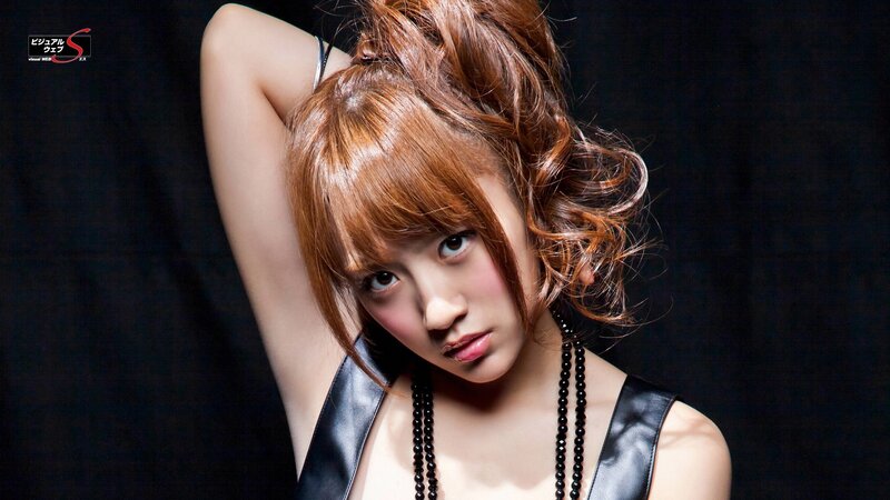 woman with red hair posing