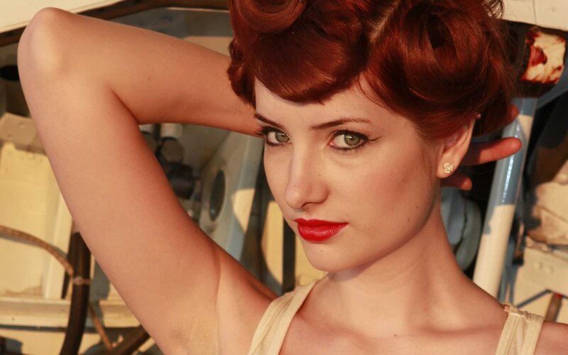 woman with red hair posing