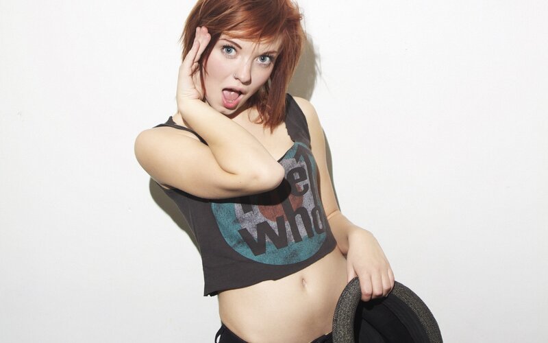 woman with red hair posing