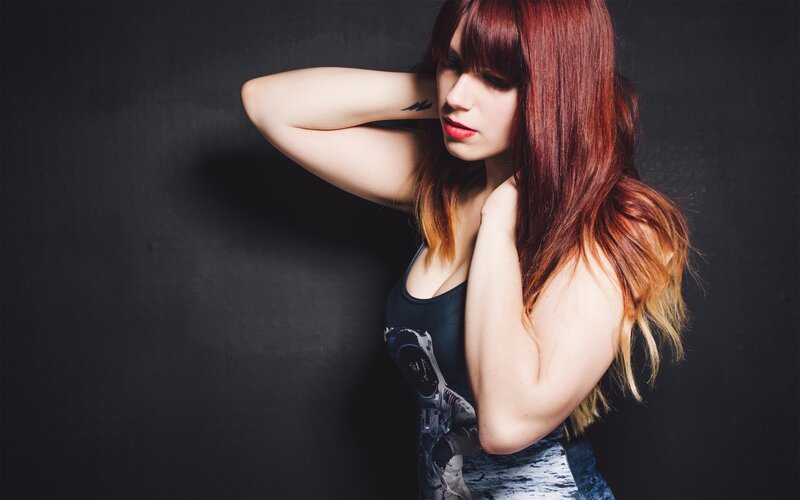 woman with red hair posing