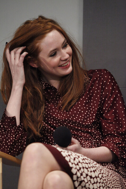 Woman with Red Hair — Relaxed, Photograph, Microphone