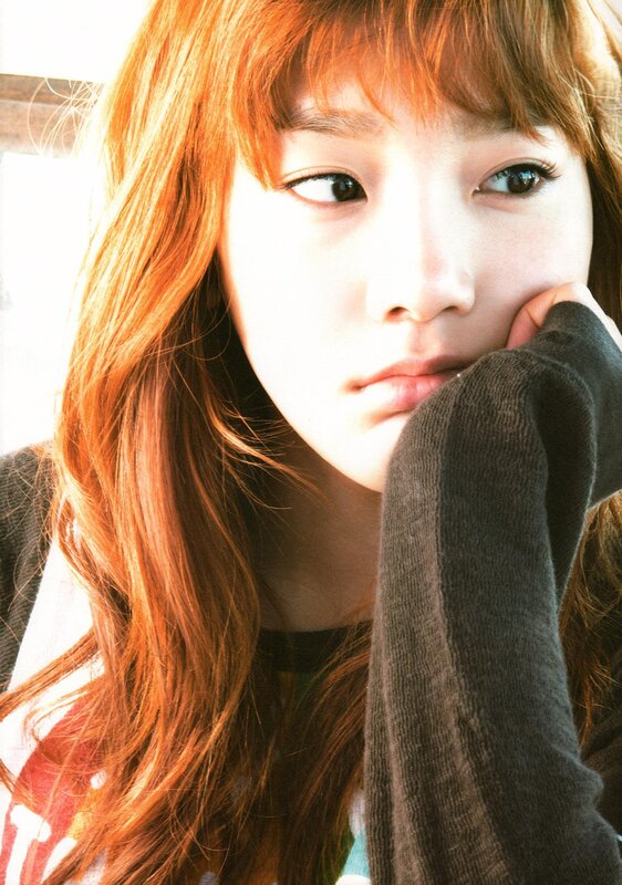 woman with red hair resting