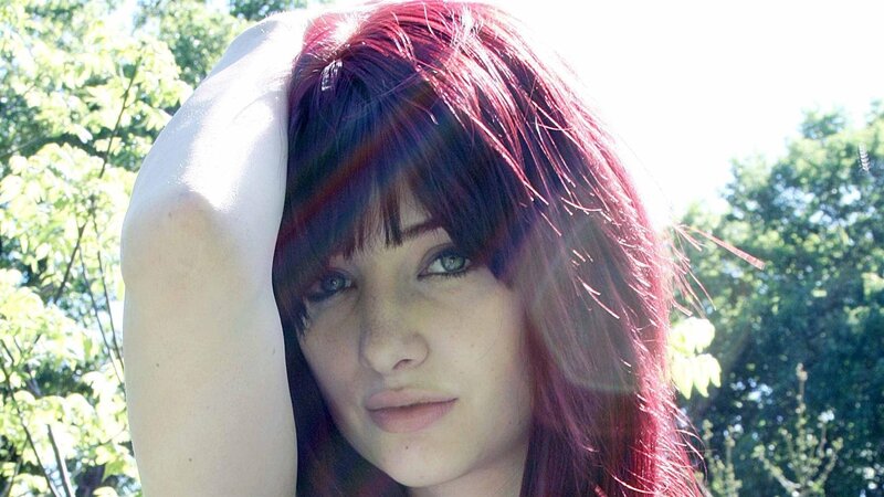 Woman with Red Hair — Serene, Daytime, Photograph, Trees