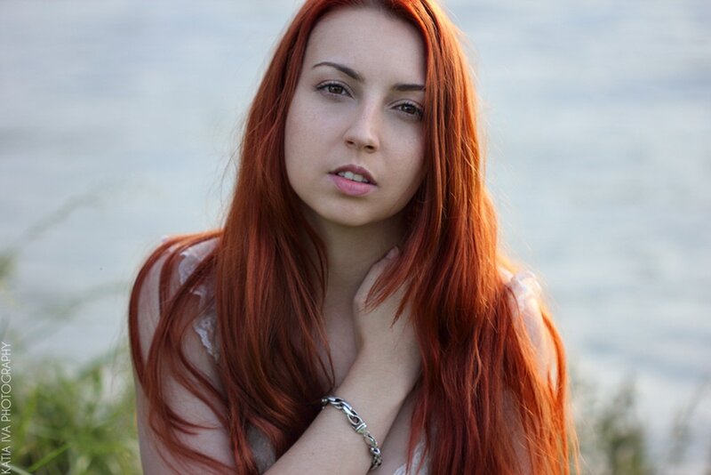 Woman with Red Hair — Serene, Sunset, Photograph, Hand