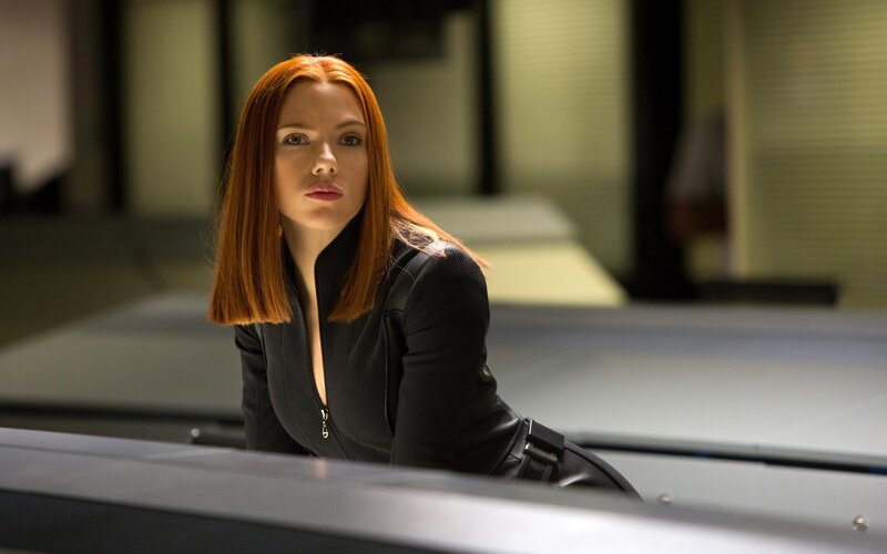 Woman with Red Hair — Serious, Photograph, Black Jacket