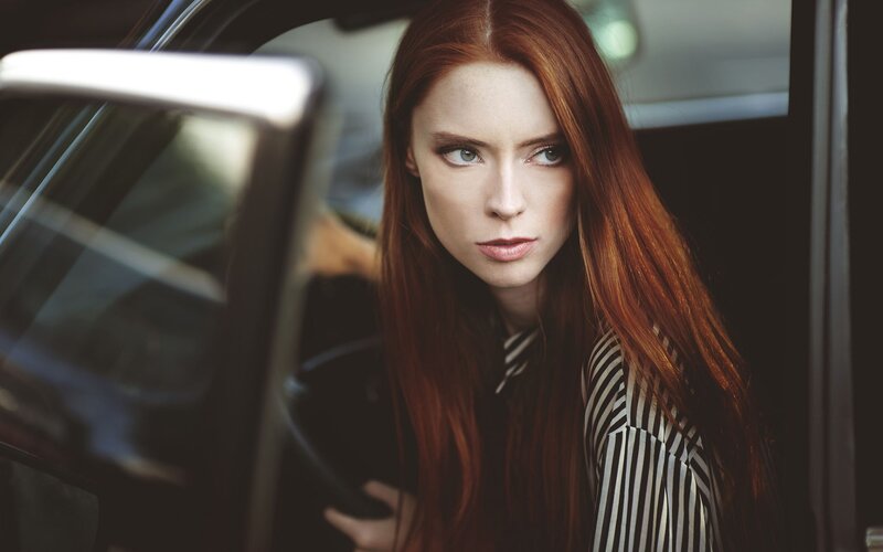 Woman with Red Hair — Serious, Photograph, Car