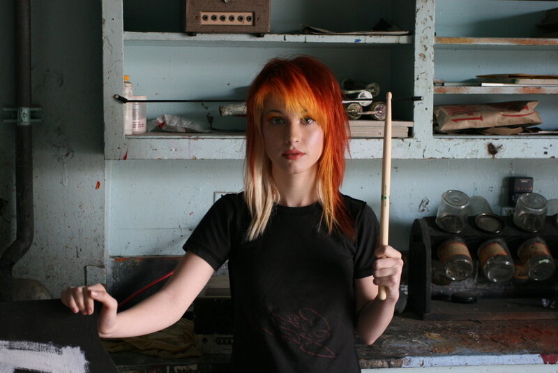 Woman with Red Hair — Serious, Photograph, Drumstick