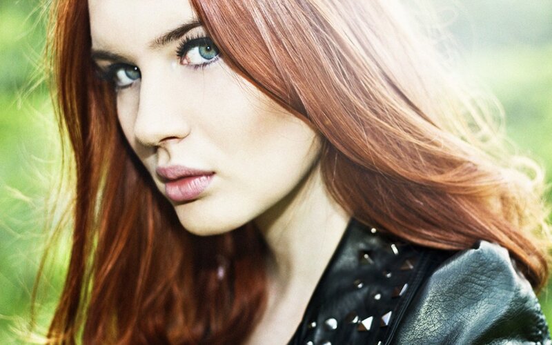 Woman with Red Hair — Serious, Photograph, Leather Jacket