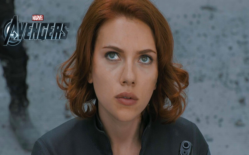Woman with Red Hair — Serious, Photograph, Marvel Logo