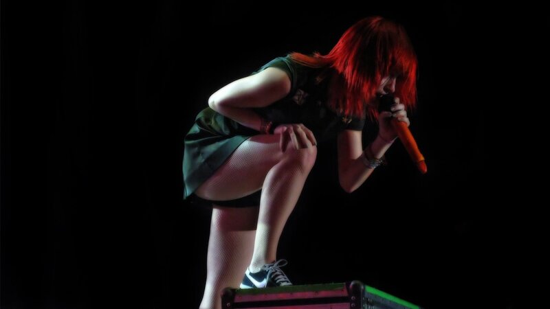 Woman with Red Hair Singing — Black, Dramatic, Night
