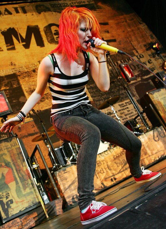 Woman with Red Hair Singing — Energetic, Photograph, Microphone, Drum Kit