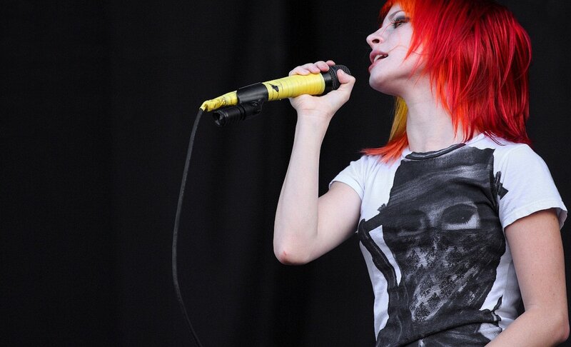 Woman with Red Hair Singing — Energetic, Photograph, Microphone