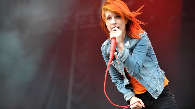 Woman with Red Hair Singing — Energetic