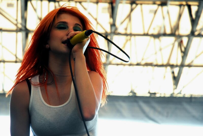 Woman with Red Hair Singing — Intense