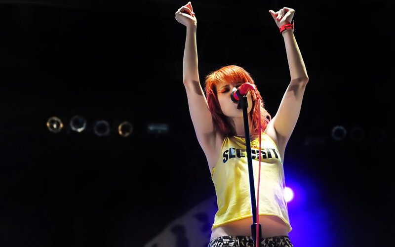 Woman with Red Hair Singing — Yellow