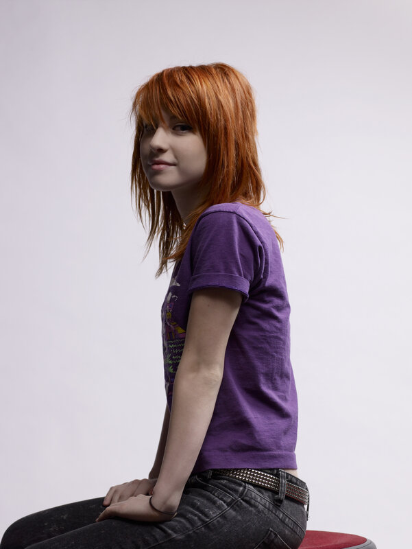 woman with red hair sitting