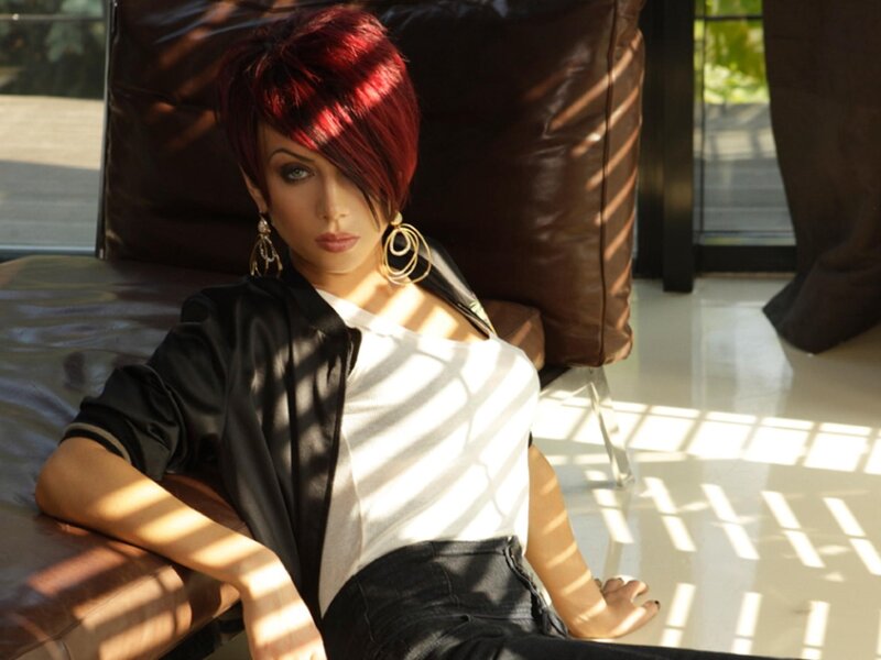 woman with red hair sitting