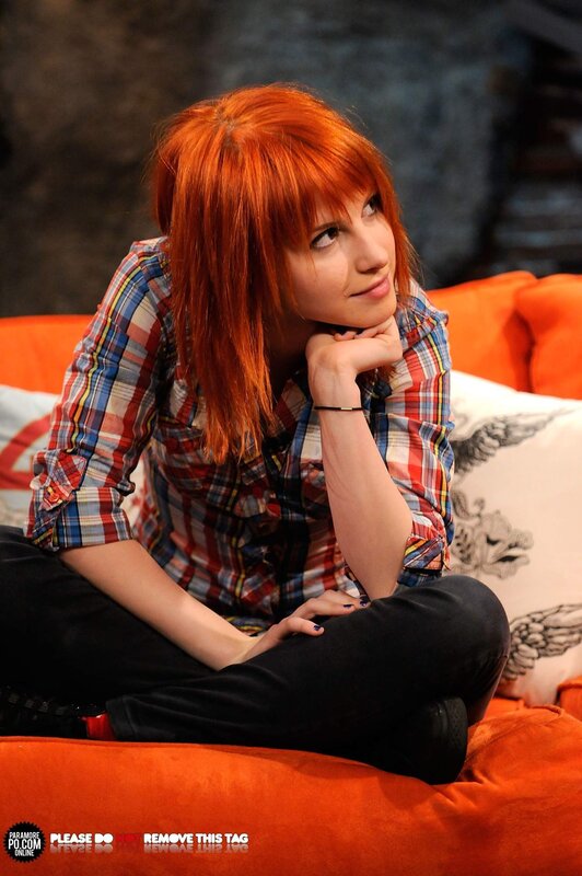 woman with red hair sitting