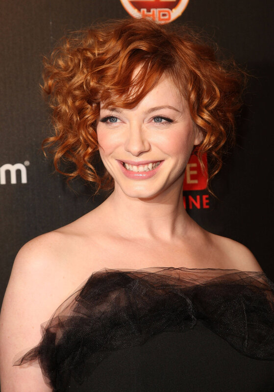woman with red hair smiling
