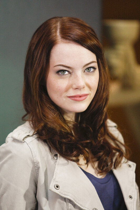 woman with red hair smiling