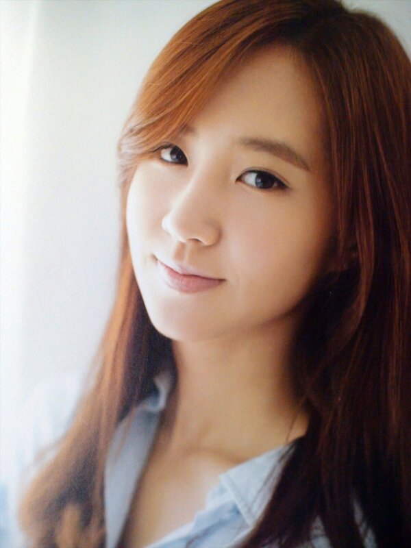 woman with red hair smiling