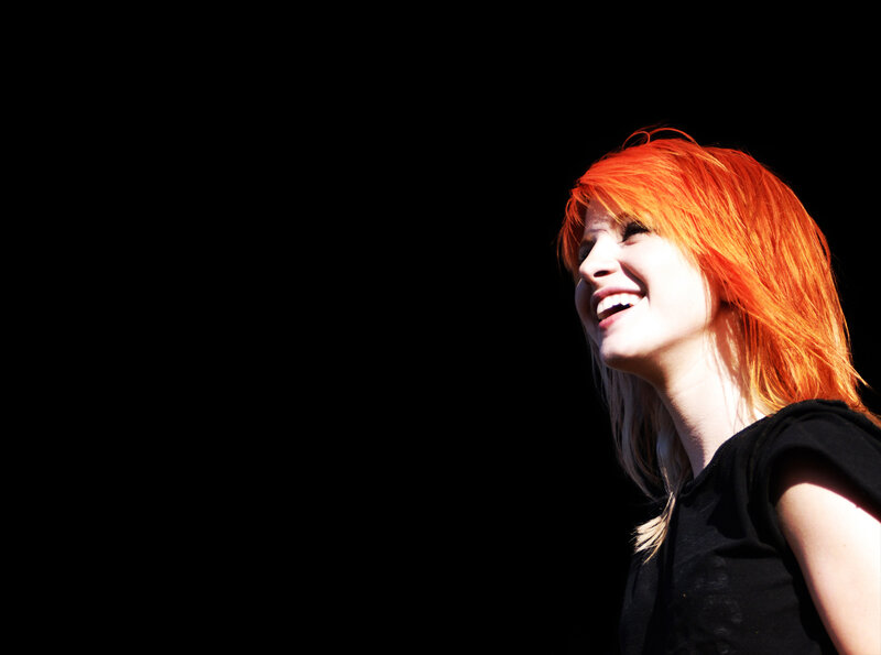 woman with red hair smiling