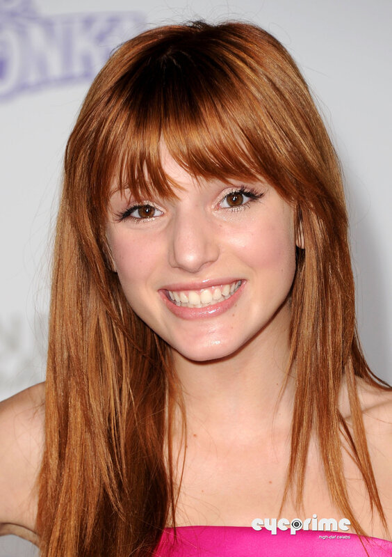woman with red hair smiling