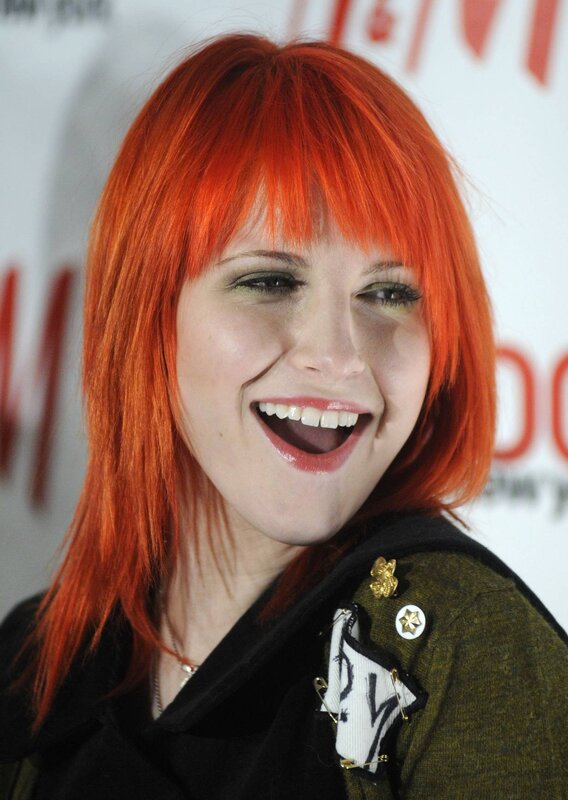 woman with red hair smiling
