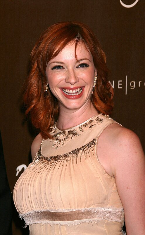 woman with red hair smiling