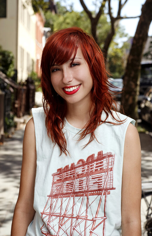 woman with red hair smiling