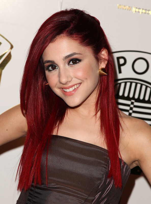 woman with red hair smiling