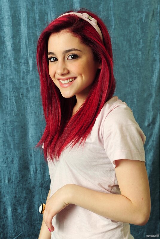 woman with red hair smiling