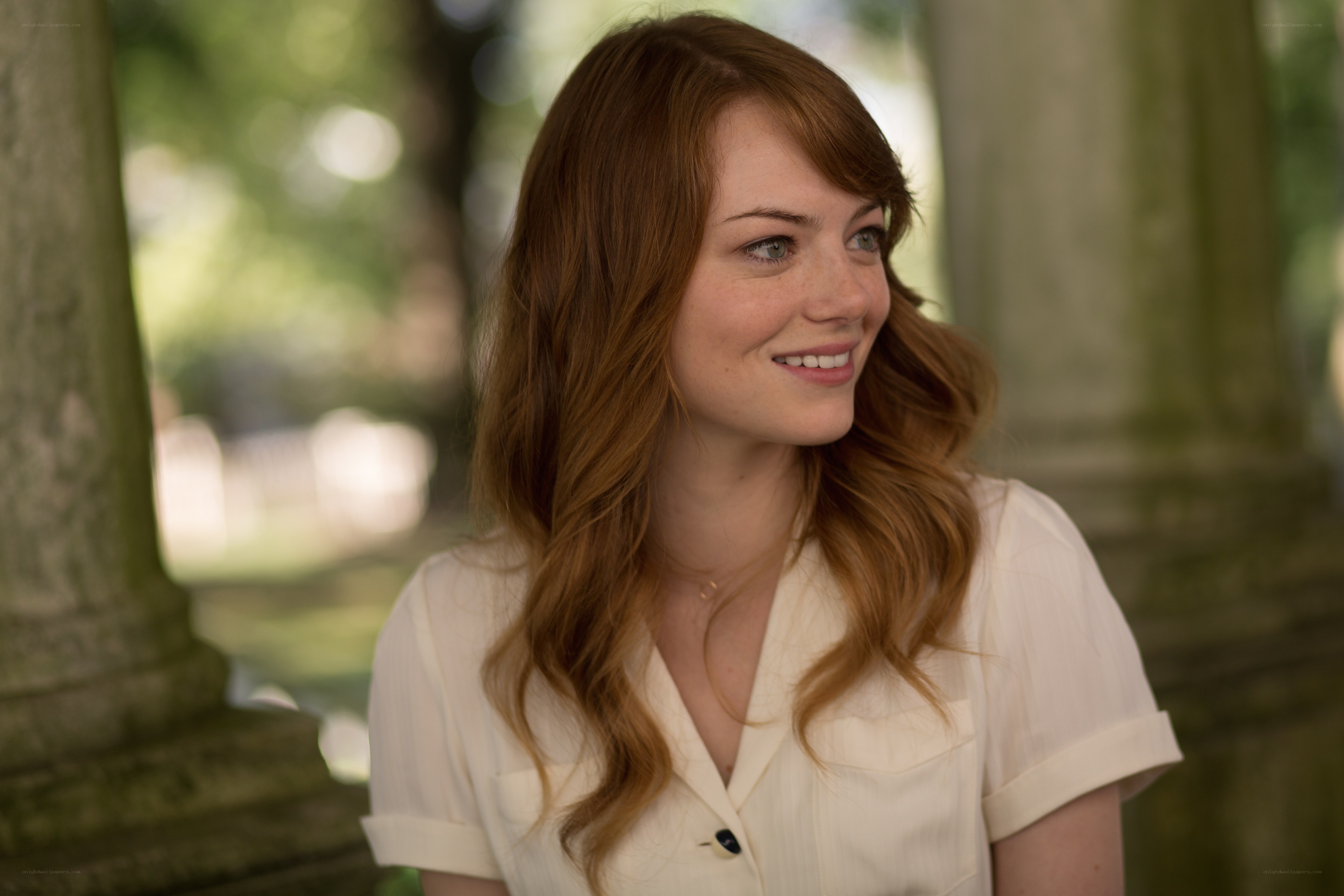woman with red hair smiling