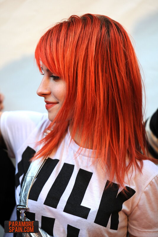 woman with red hair smiling