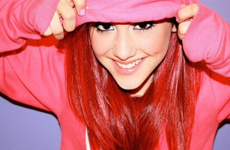 woman with red hair smiling