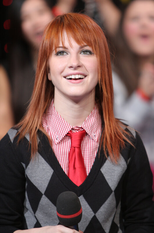 Woman with red hair smiling