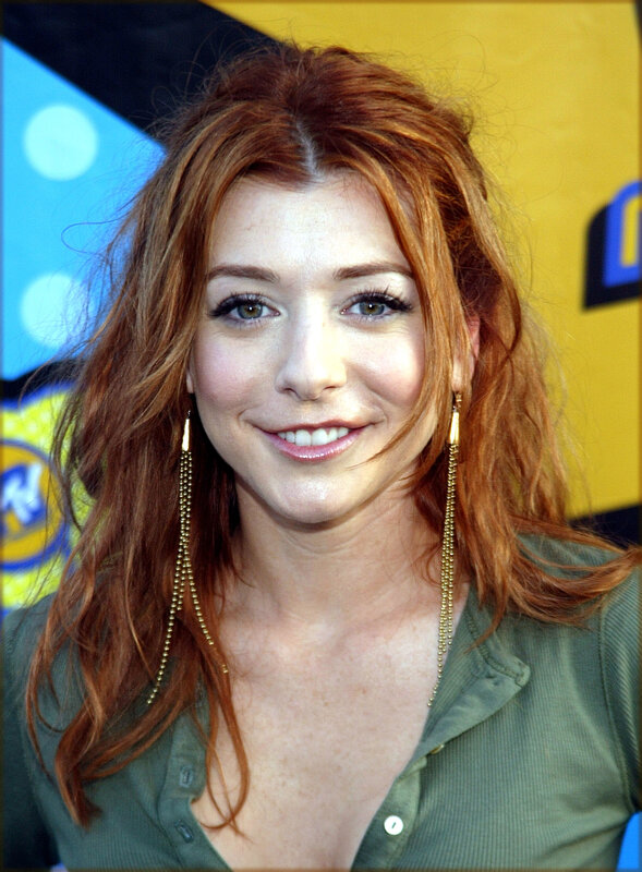 woman with red hair smiling