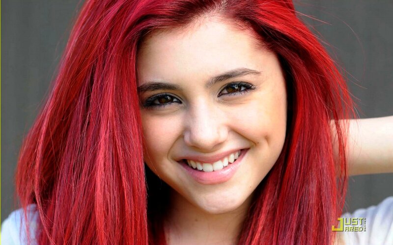 woman with red hair smiling