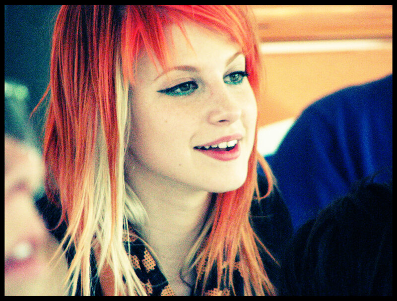 woman with red hair smiling