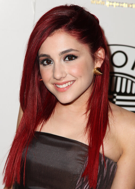 woman with red hair smiling