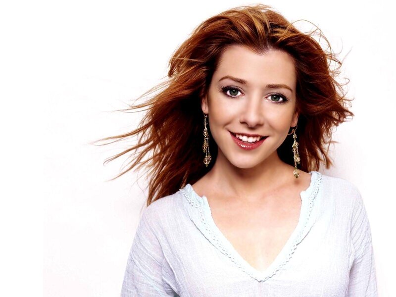 woman with red hair smiling