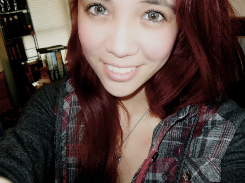 woman with red hair smiling