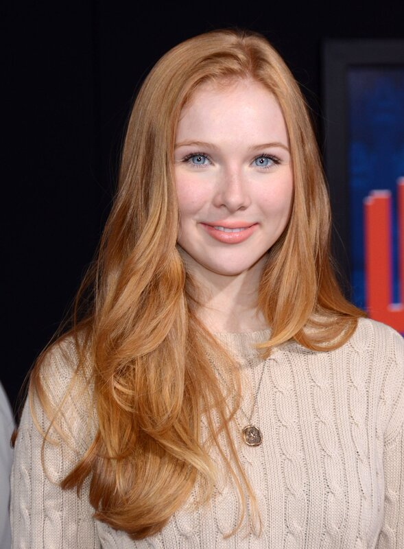 woman with red hair smiling