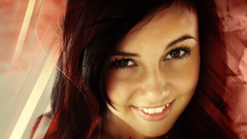 woman with red hair smiling