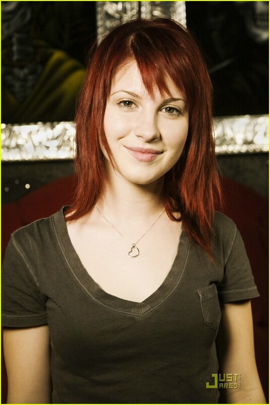 woman with red hair smiling