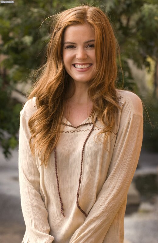 woman with red hair smiling